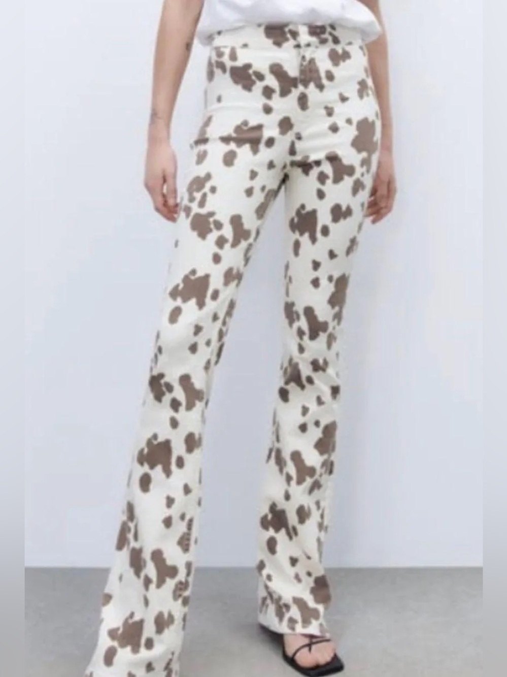 ZARA High-Waist Cowprint Flare Jeans in Cream & Brown. New